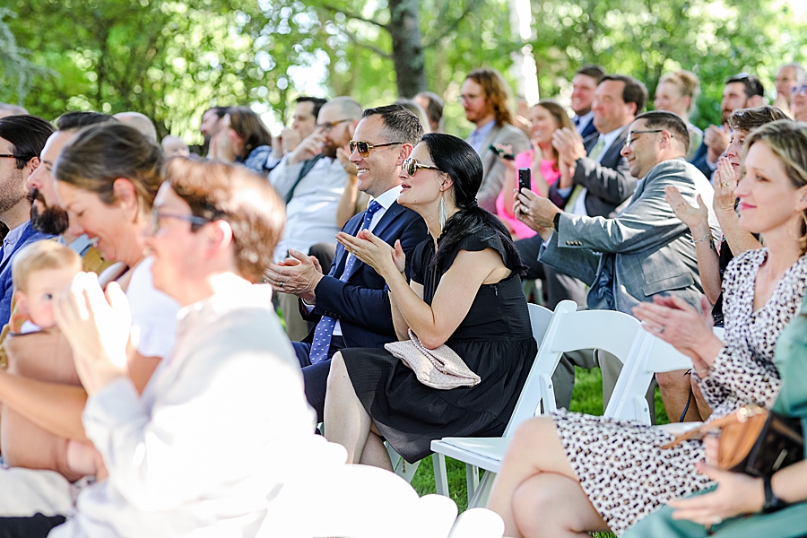 Guests cheer at Knoxville Botanical Gardens Wedding by Amanda May Photos