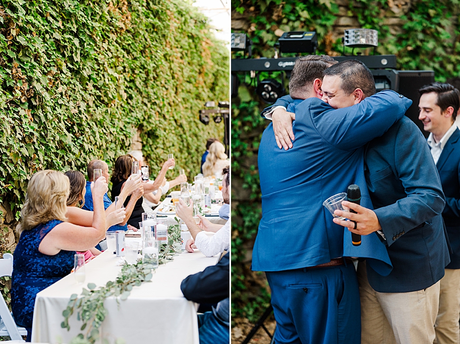 Groom hugs friend at Wedding by Amanda May Photos