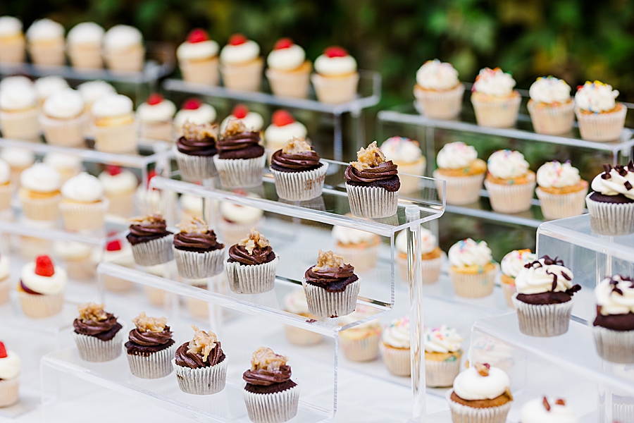 Cupcake on a table at Wedding by Amanda May Photos