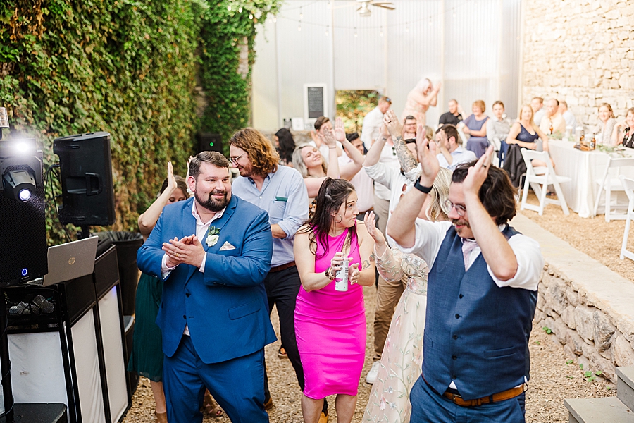 Groom dancing at Wedding by Amanda May Photos