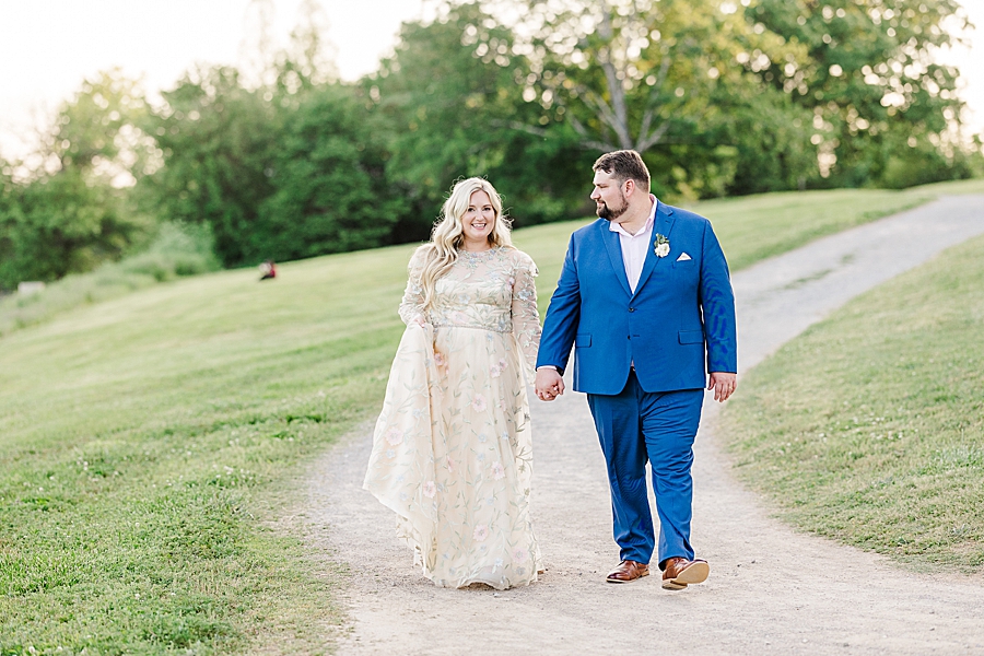 Walking down the path at Wedding by Amanda May Photos