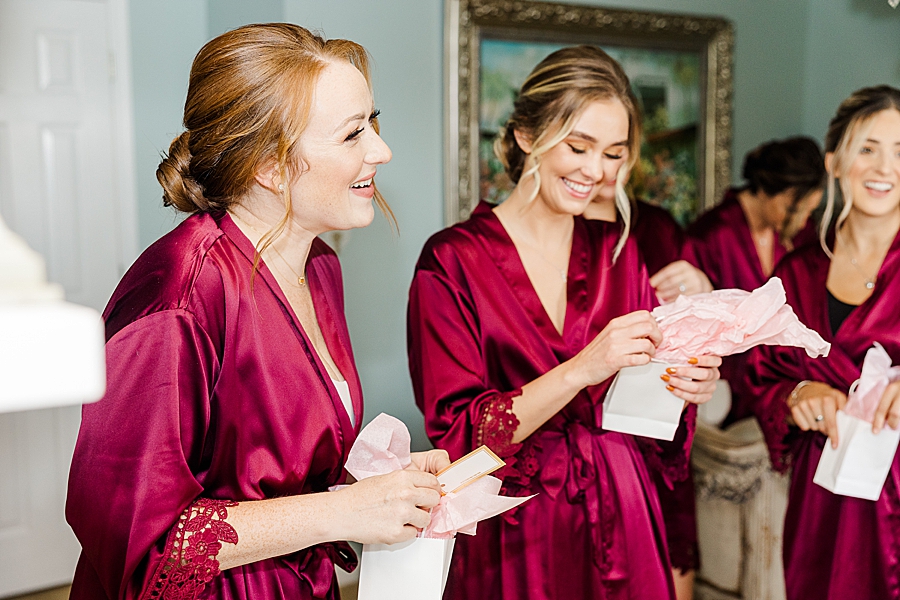 bridesmaids opening gifts