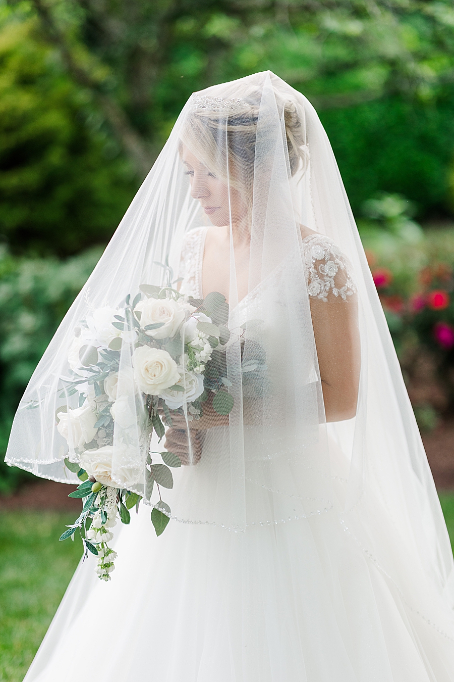 Bride under veil at castleton farms bridal session