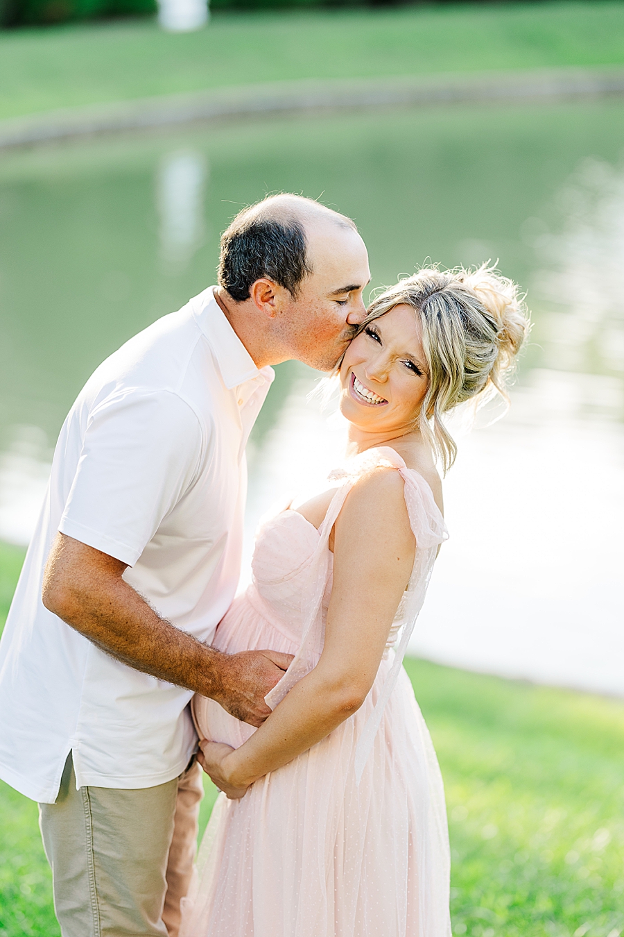 kiss on the cheek at castleton farms maternity session