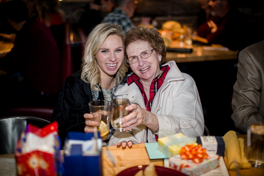 Toasting with her nana at this dinner at Sunspot after the University of Tennessee graduation by Amanda May Photos.