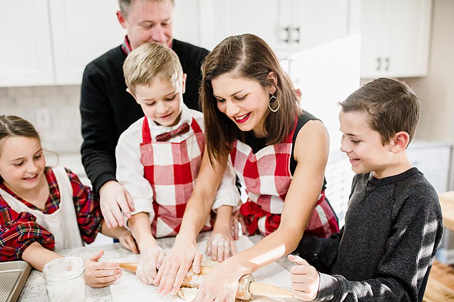Rolling dough at this Christmas cookie session by Knoxville Wedding Photographer, Amanda May Photos.