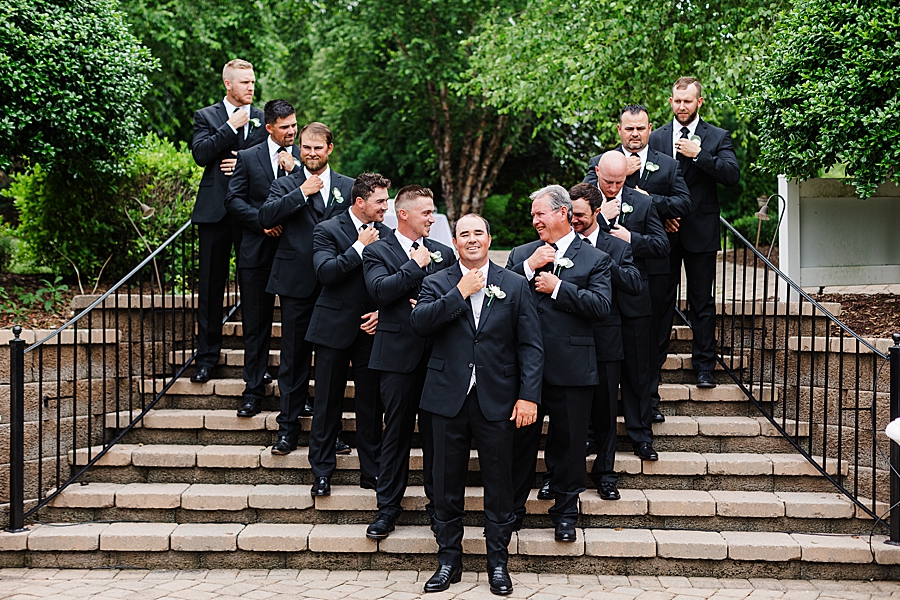 groomsmen on stairs at cinderella wedding