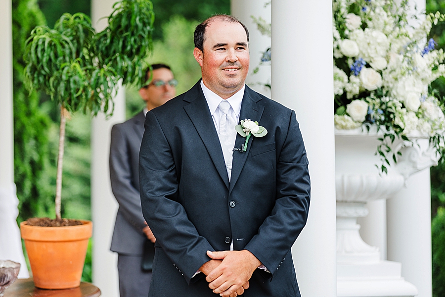 smiling groom at cinderella wedding