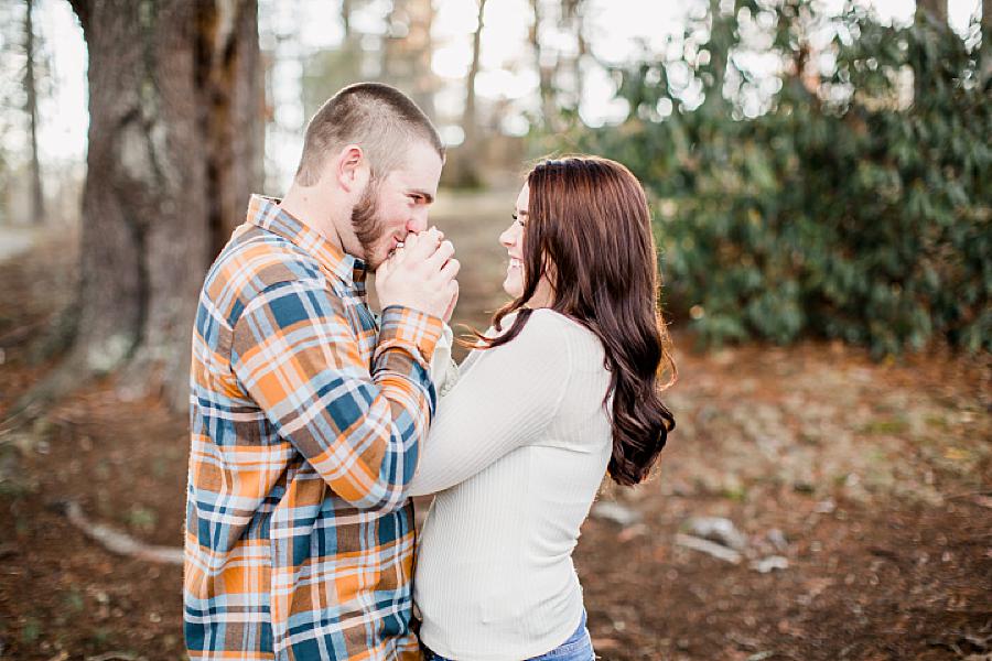 Kiss on the hands at this Cumberland Mountain Engagement Session by Knoxville Wedding Photographer, Amanda May Photos.
