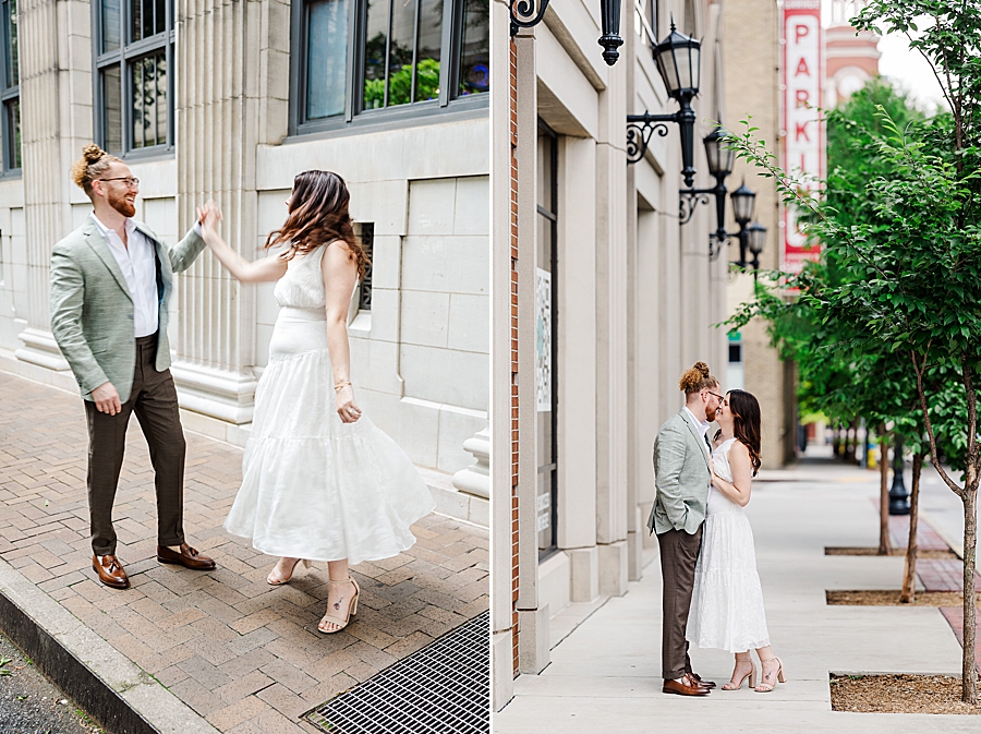 twirling on sidewalk during downtown knoxville engagement