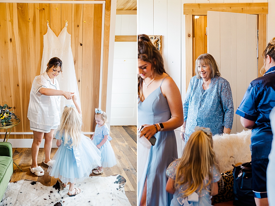 Bride playing with flower girls at Allenbrooke Farm wedding by Amanda May Photos