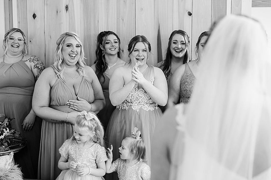 Bridesmaids laughing at Allenbrooke Farm wedding by Amanda May Photos