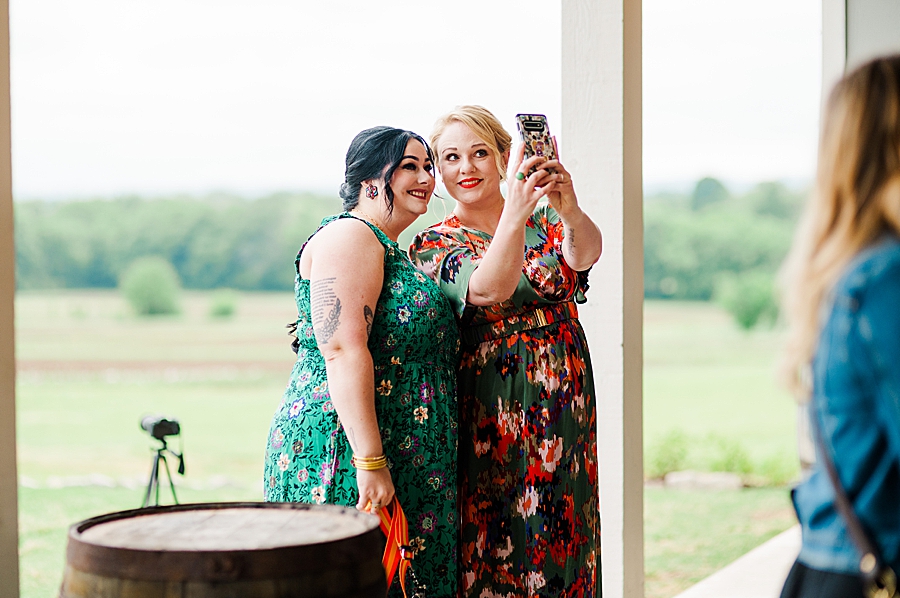 Guests taking a selfie at Allenbrooke Farm wedding by Amanda May Photos