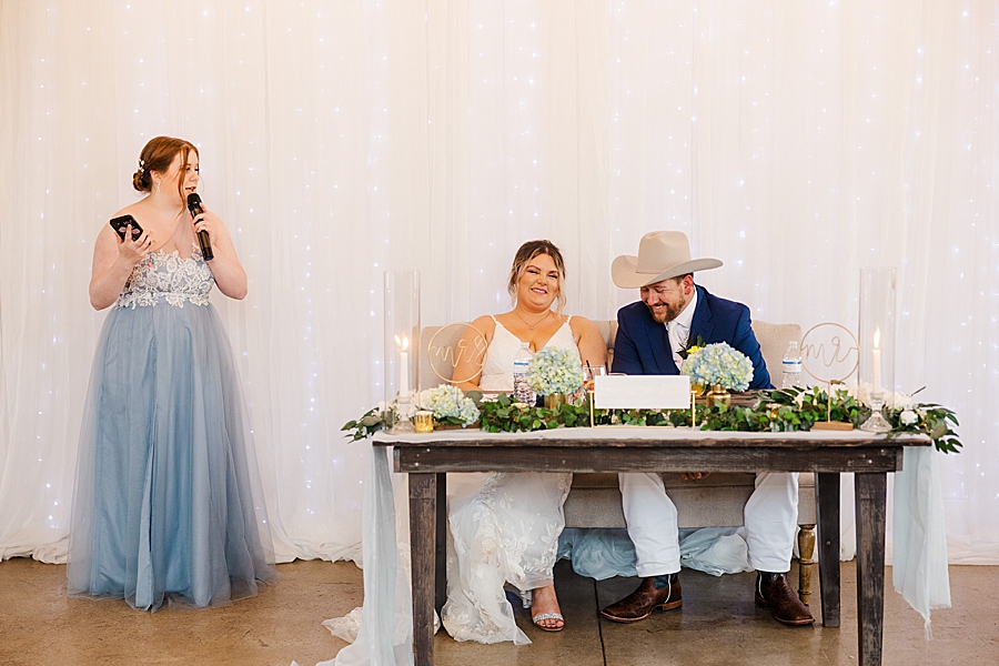 Bridesmaid gives a speech at wedding by Amanda May Photos