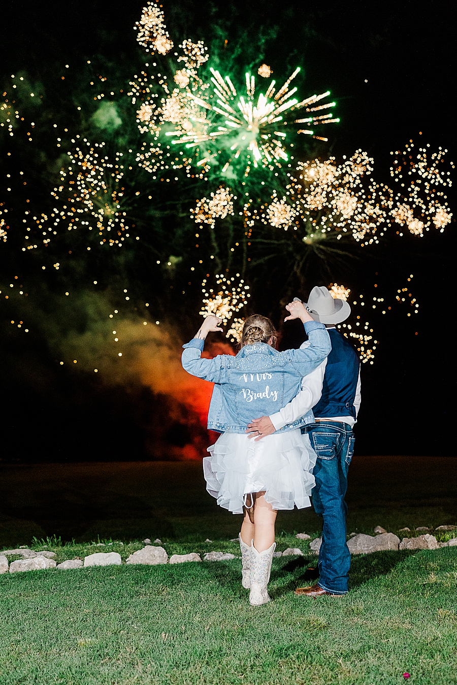 Watching the fireworks at wedding by Amanda May Photos