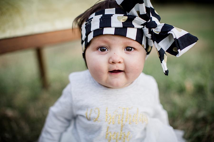 Black and white DIY bow at this 6 month photos session at Knoxville Botanical Gardens by Knoxville Wedding Photographer, Amanda May Photos.