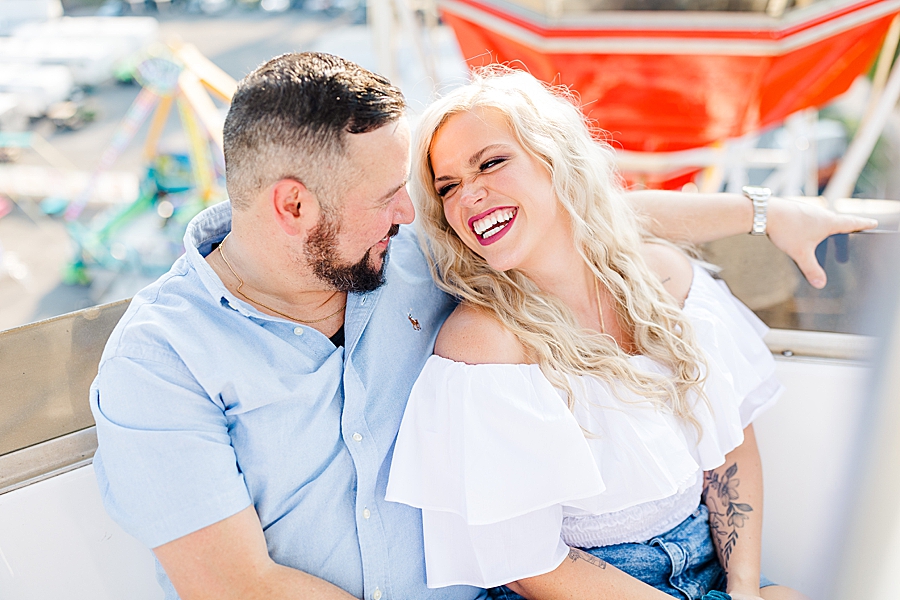 laughing at this fair engagement session