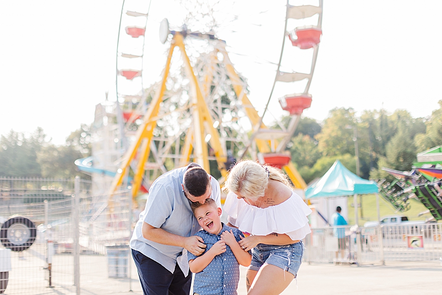 family having fun at this fair engagement session