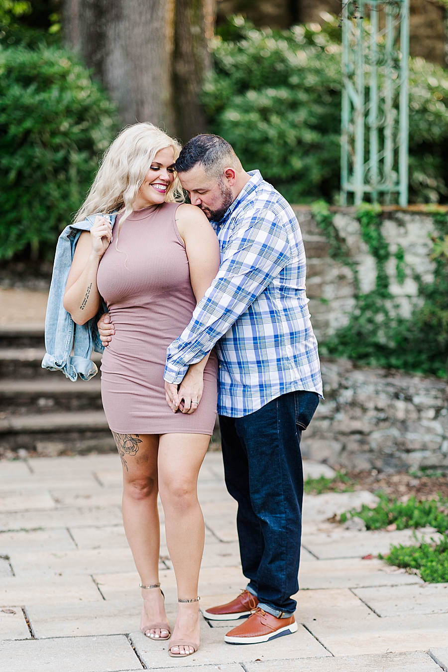 kiss on the shoulder at this fair engagement session