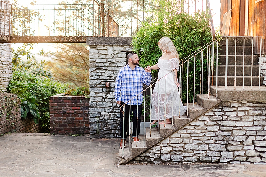 walking down stairs at this fair engagement session