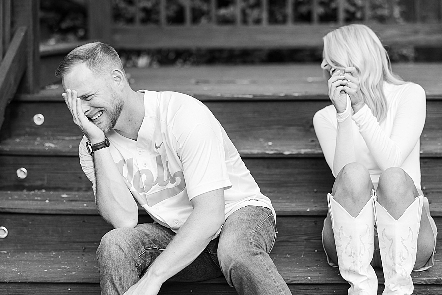 black and white photo of couple laughing