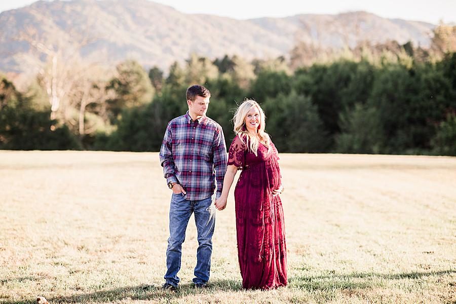 Plaid shirt at this farm maternity session by Knoxville Wedding Photographer, Amanda May Photos.
