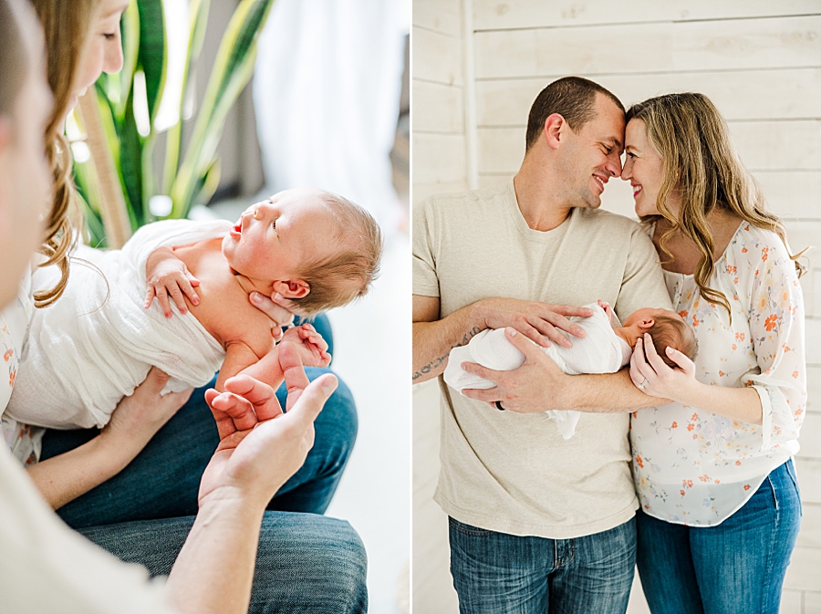 foreheads together at floral newborn session