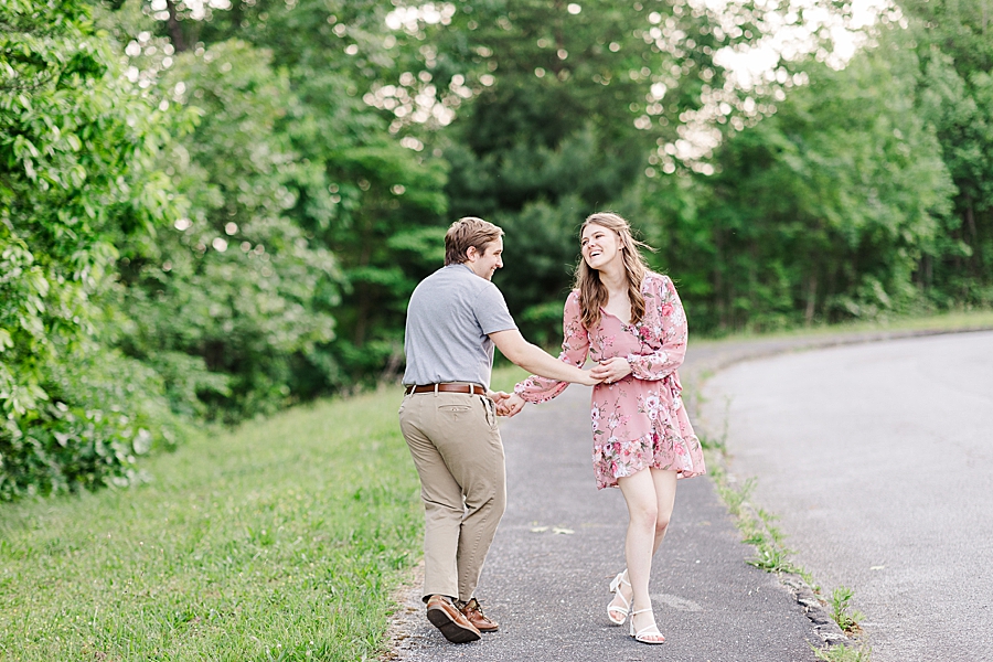 couple being silly at foothills parkway engagement