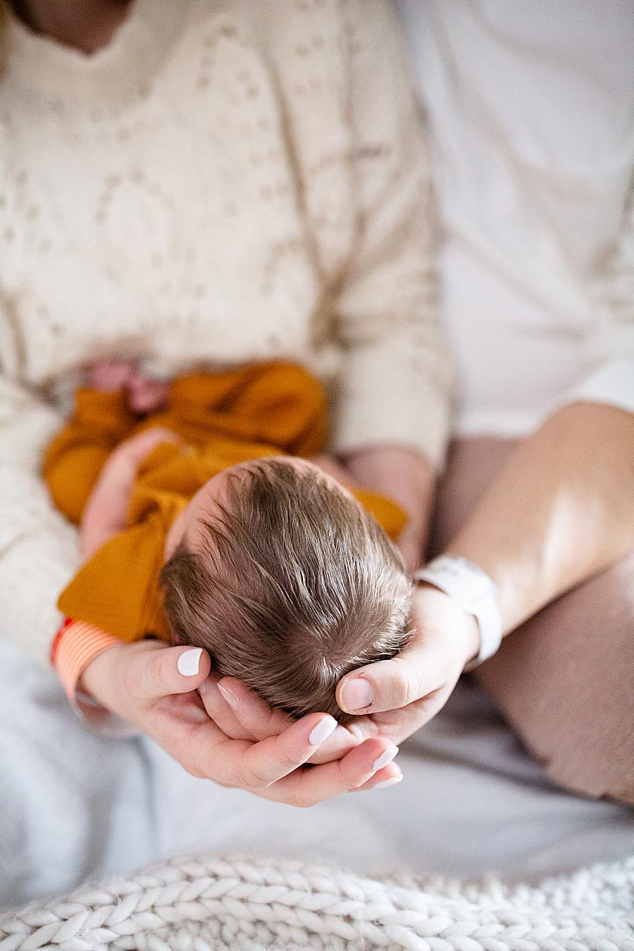 mom holding newborn