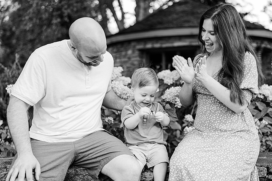 family clapping at garden family session