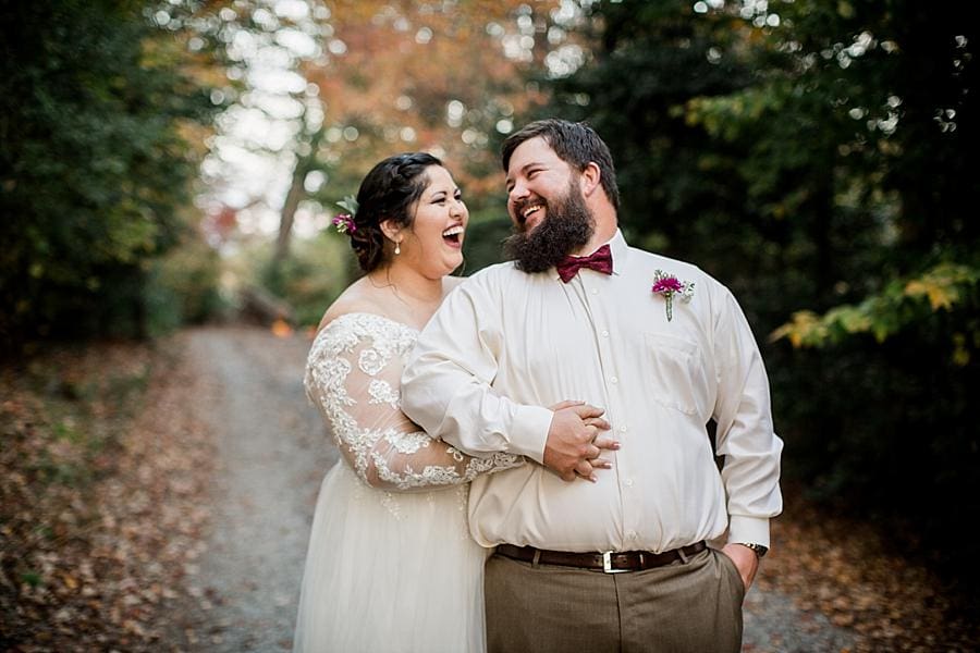 Hugging him from behind at this Sampson's Hollow Wedding by Knoxville Wedding Photographer, Amanda May Photos.