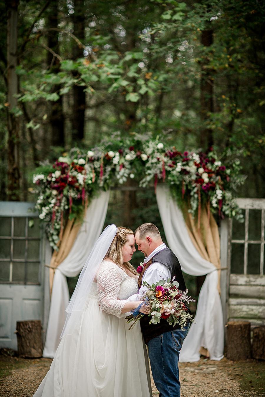 Flower arch at this Sampson's Hollow Fall Wedding by Knoxville Wedding Photographer, Amanda May Photos.