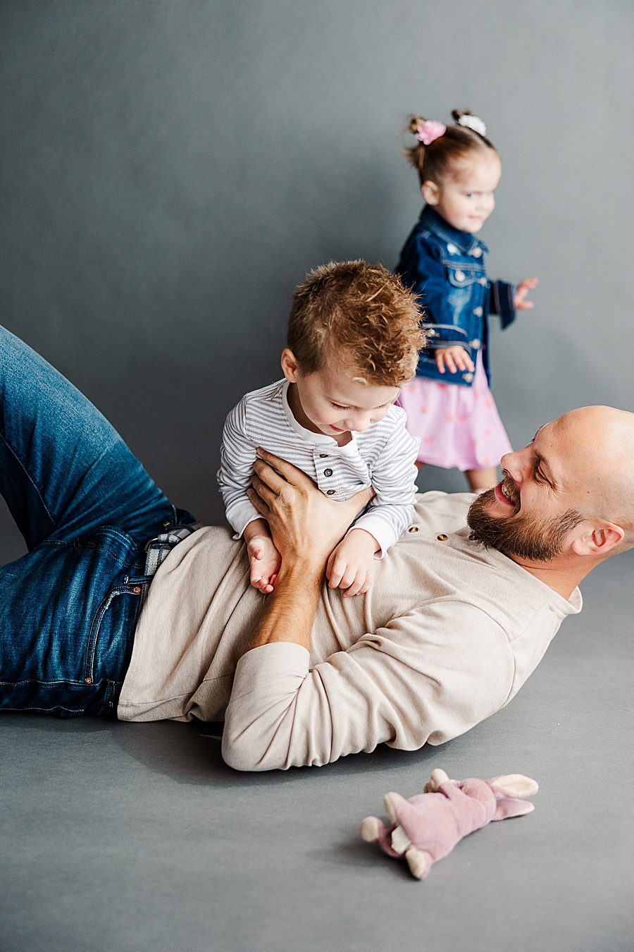 dad tickling son