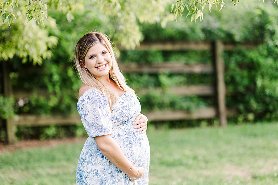 pregnant woman holding baby bump
