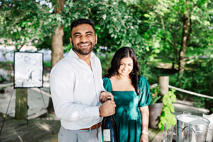 popping champagne at hunter valley proposal