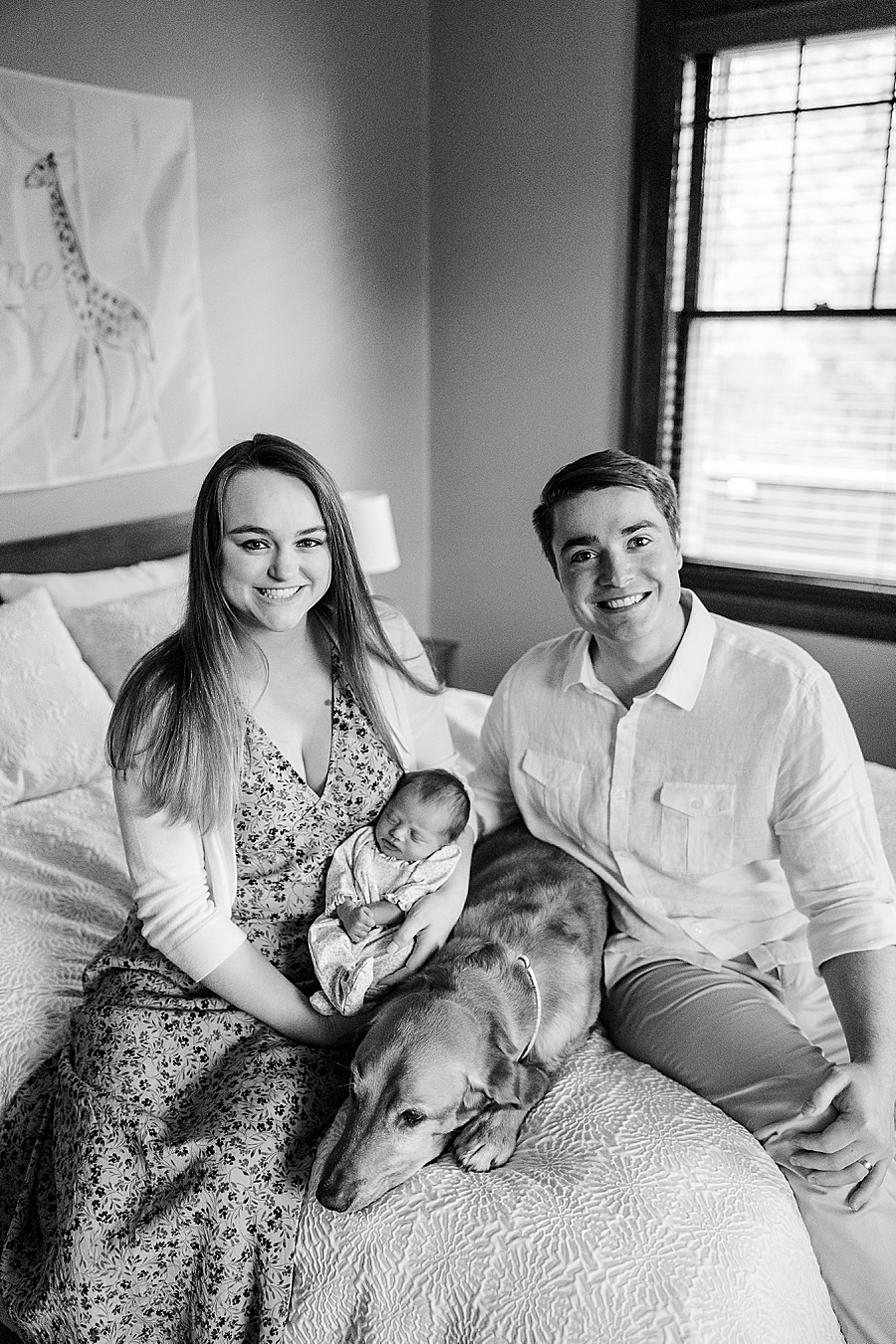 family of 3 at in home newborn session