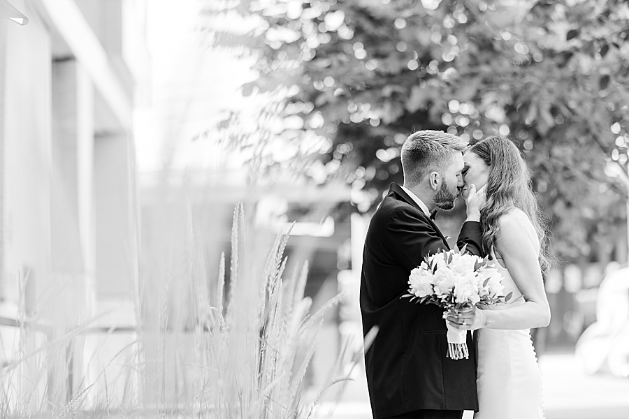 Kissing at Mill & Mine Wedding by Amanda May Photos