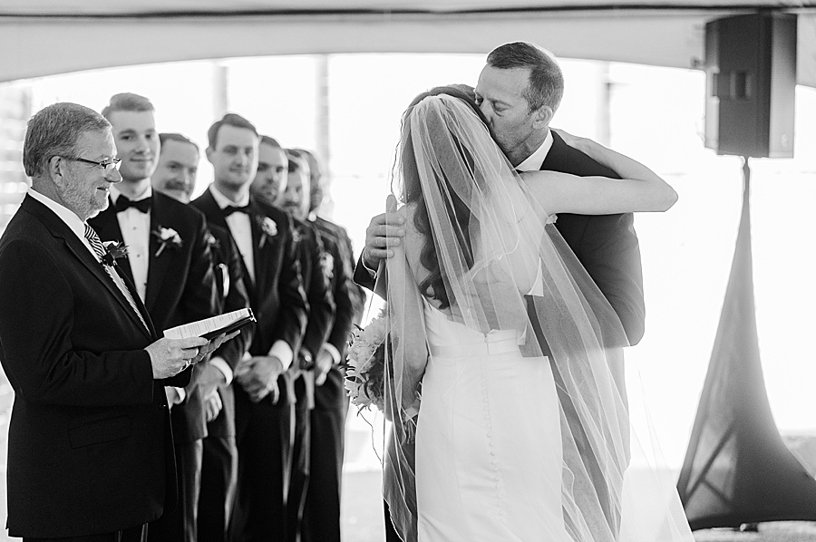 Dad kisses bride's cheek at Mill & Mine Wedding by Amanda May Photos