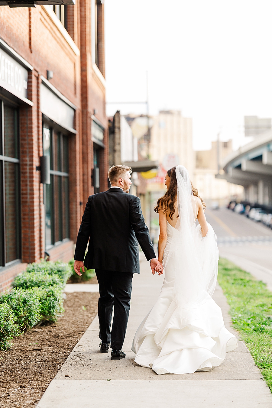 Walking along the path at Wedding by Amanda May Photos