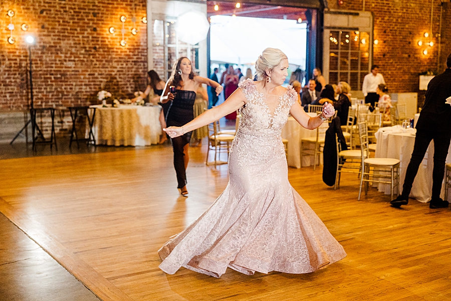 Mom dancing at Wedding by Amanda May Photos
