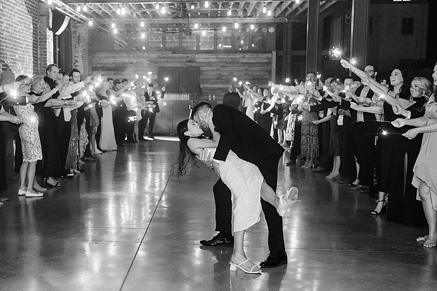 Bride and groom exit at Wedding by Amanda May Photos