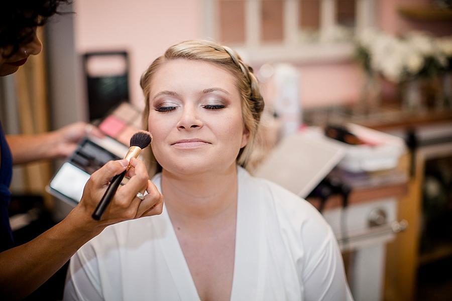 Putting on blush at this Cheval Manor Wedding by Knoxville Wedding Photographer, Amanda May Photos.