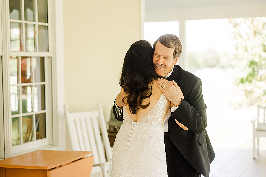 Bride and dad hug at Marblegate Wedding by Amanda May Photos