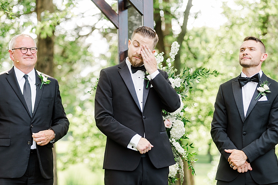 Groom wipes eyes at Marblegate Wedding by Amanda May Photos
