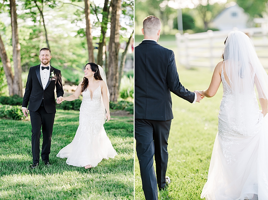 Holding hands and walking at wedding by Amanda May Photos