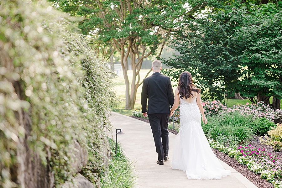 Walking down the path at wedding by Amanda May Photos