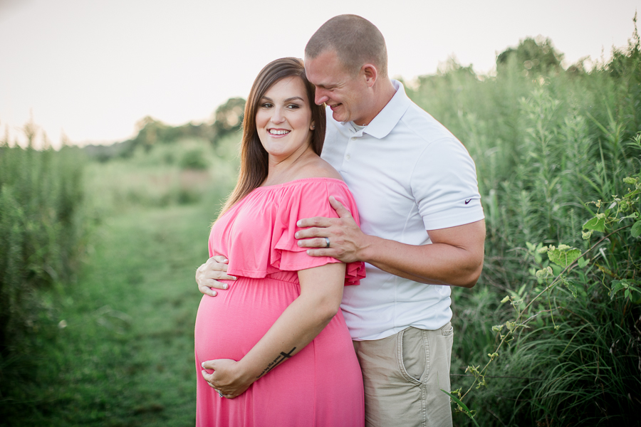 Laughing together at this Sterchi Hills maternity session by Knoxville Wedding Photographer, Amanda May Photos.