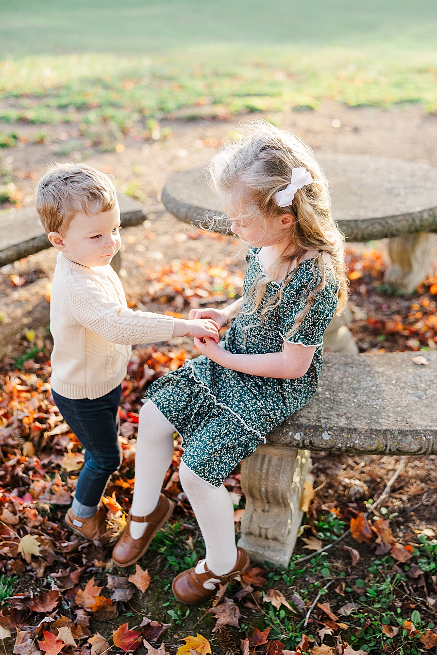 kids sitting at picnic table in lenoir city