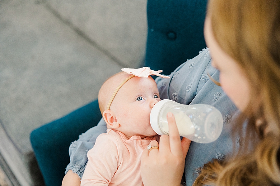 baby eating bottle at lifestyle session
