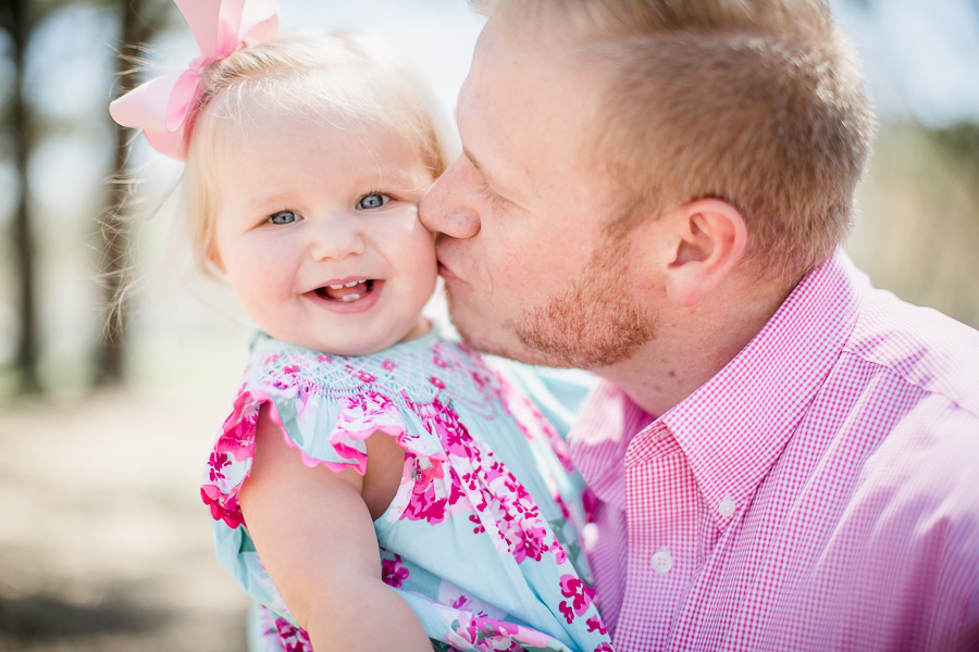 Daddy kissing her cheek at this Adair Park Family session by Knoxville Wedding Photographer, Amanda May Photos.